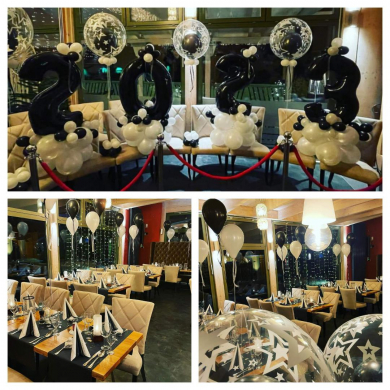 Silvesterdekoration in Weiß und Schwarz