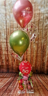 Box mit fliegenden Ballons