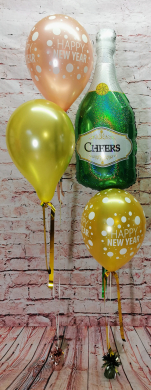 Silvesterdekoration mit Sektflasche