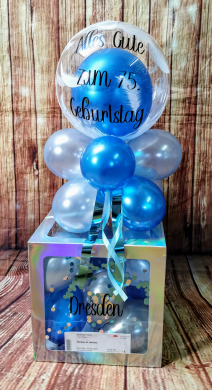 Box in Blau mit durchsichtigen Ballon