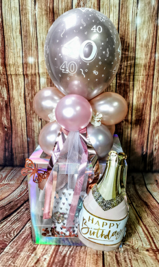 Box in Rosegold und Rosa mit Sektflasche