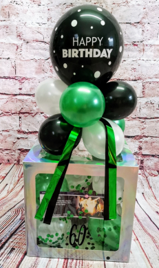 Box in Grün, Schwarz und Weiß