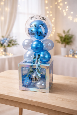 Box in Blau mit durchsichtigen Ballon