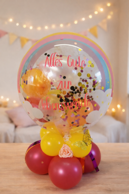 Ballon zur Lebenswende mit Regenbogen