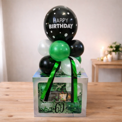 Box in Grün, Schwarz und Weiß