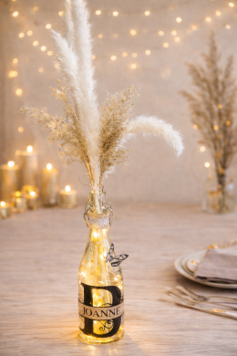 Leuchtflasche mit Namen und Dekoration