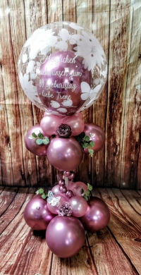 Box mit Sektflasche und Zahl